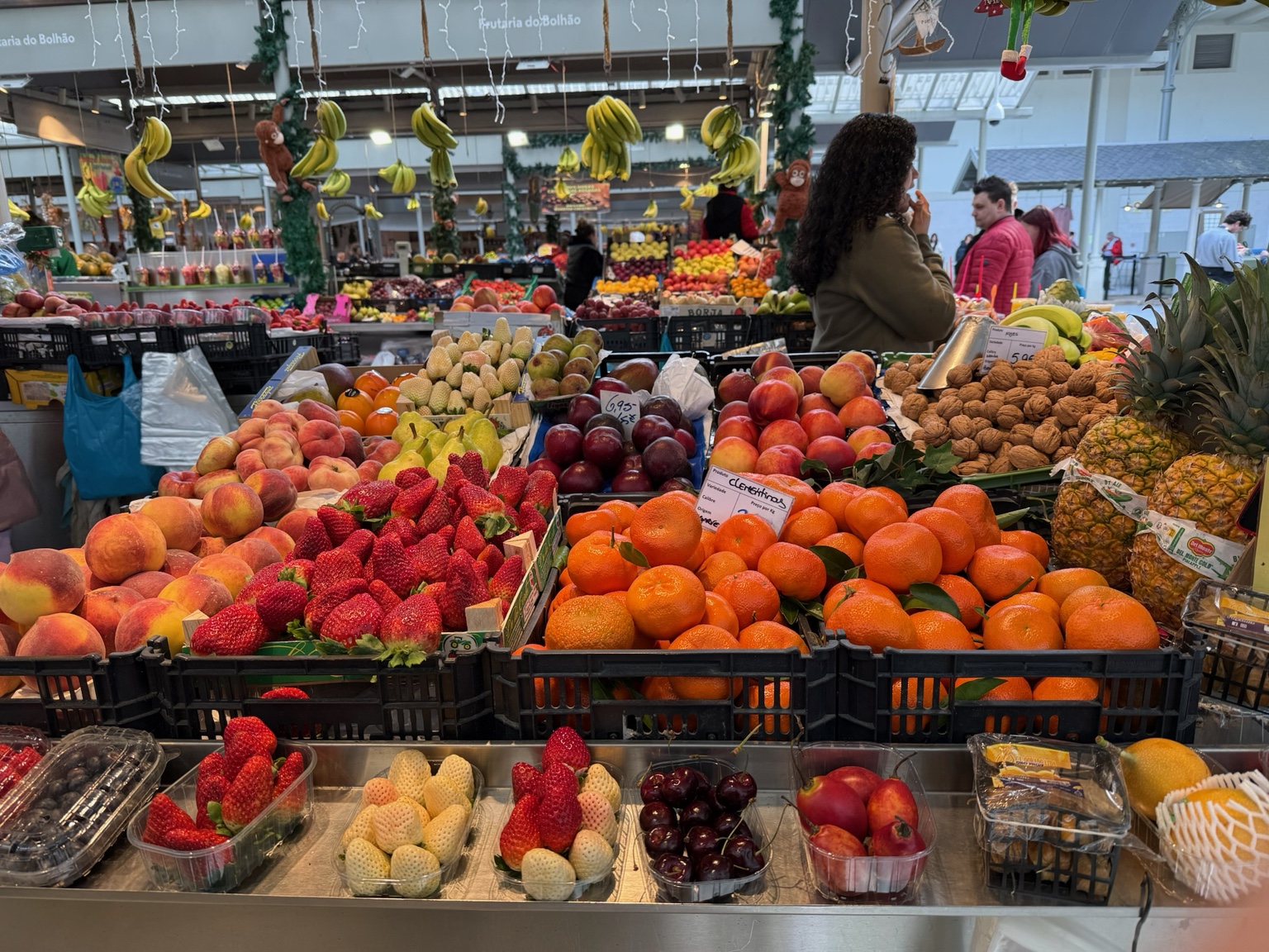 Colorful fruit displays inside Mercado do Bolhão