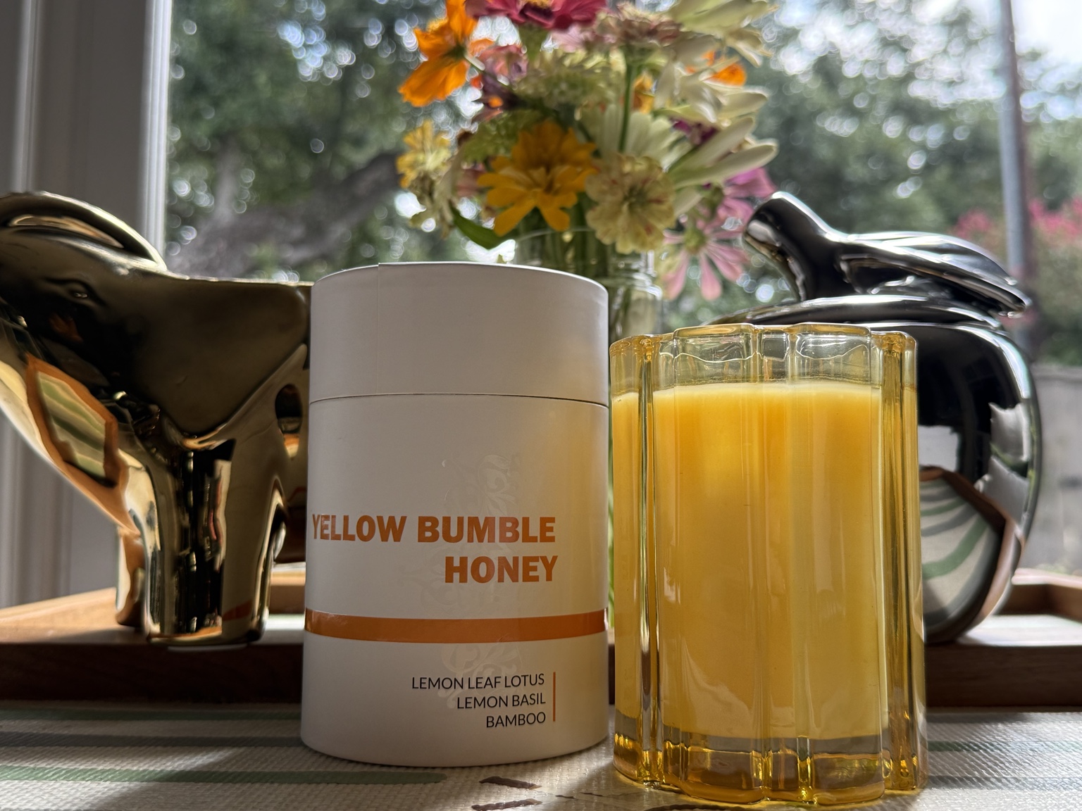 Thompson Ferrier Yellow Bumble Honey candle and its packaging